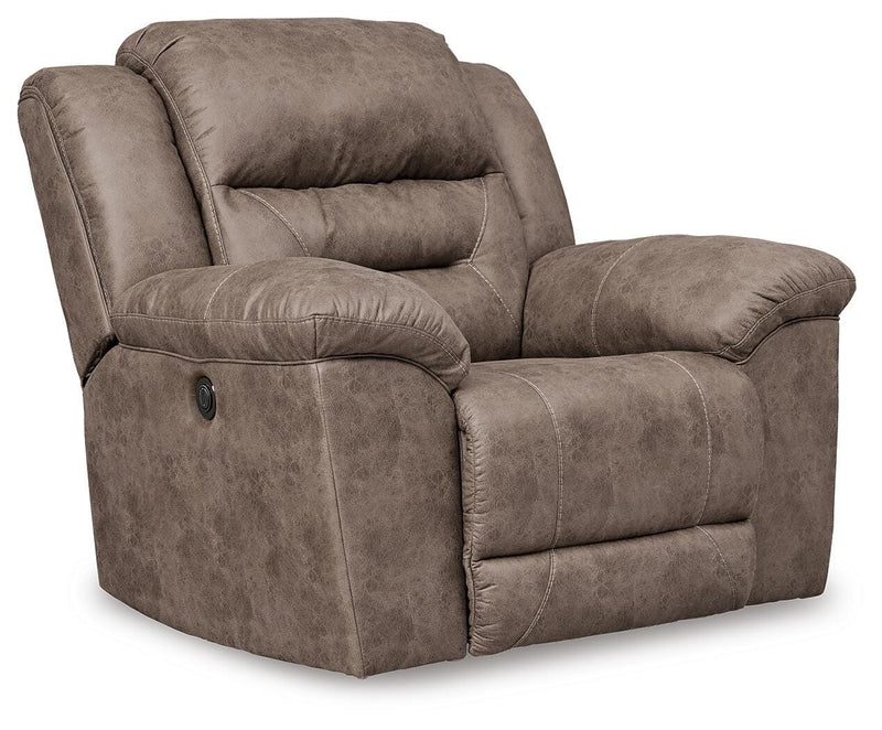 Ashley Furniture Stoneland living room set featuring a sofa and matching chairs in a modern design.