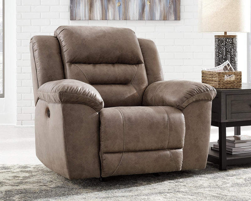 Ashley Furniture Stoneland living room set with sofa and loveseat in neutral fabric, modern design, and plush cushions.