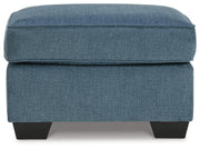 Ashley Furniture Cashton living room set featuring a sofa and loveseat with plush cushions and modern design.