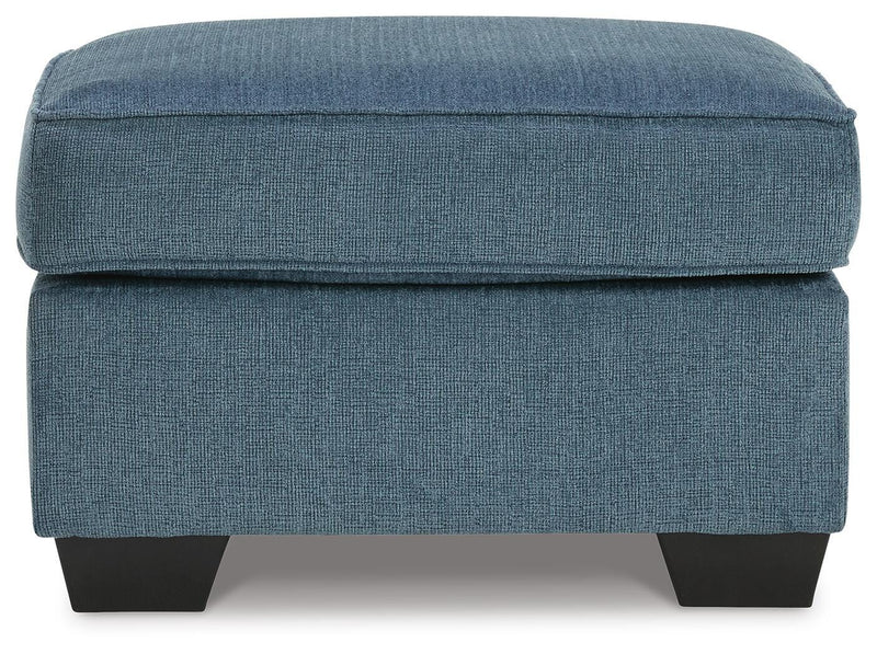 Ashley Furniture Cashton living room set featuring a sofa and loveseat with plush cushions and modern design.