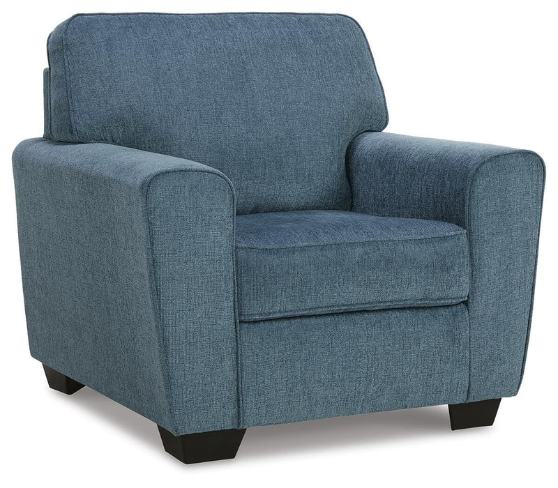 Ashley Furniture Cashton Living Room Set with a sofa and loveseat shown from an angled view in a modern living room setting.
