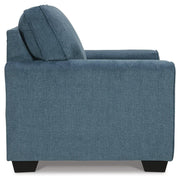 Ashley Furniture Cashton living room set with sofa and armchair in a cozy, modern design, shown in a stylish living room setup.