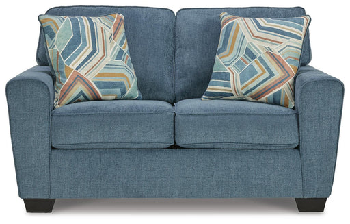 Ashley Furniture Cashton loveseat with plush fabric and cushioned backrest, shown from a head-on perspective.