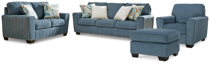Ashley Furniture Cashton living room set with sofa and loveseat in neutral fabric, modern design with plush cushions.