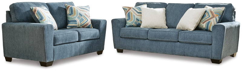 Ashley Furniture Cashton living room set with sofa and loveseat in neutral upholstery, modern design, and plush cushions.
