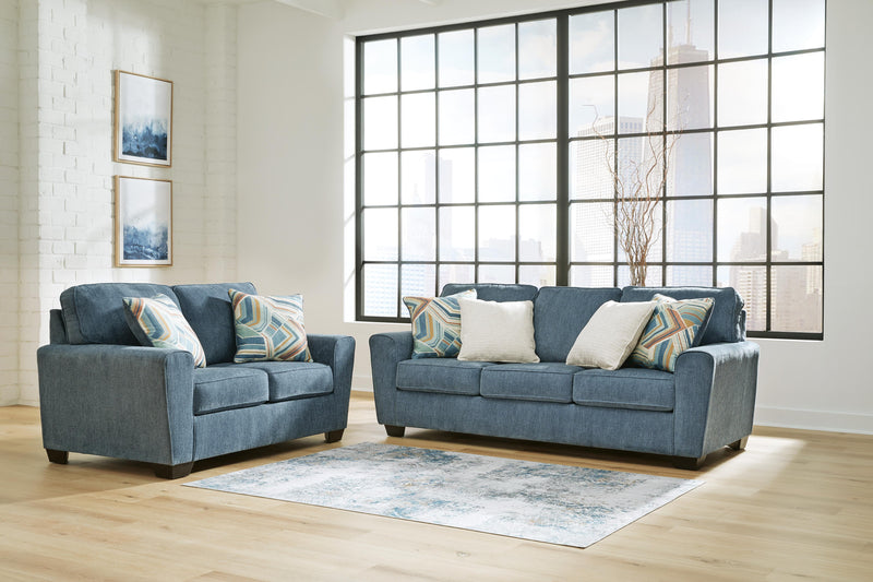 Ashley Furniture Cashton living room set with sofa and armchair, upholstered in neutral fabric, modern design for stylish comfort.