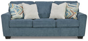 Ashley Furniture Cashton living room set featuring a sofa and loveseat with plush cushions and modern design.