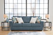 Ashley Furniture Cashton sofa featuring plush cushions and neutral fabric upholstery, shown in a modern living room setting.
