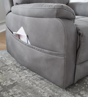 Ashley Furniture Next-Gen Durapella Power Lift Recliner with pocket on side, plush cushioning, and adjustable reclining features.