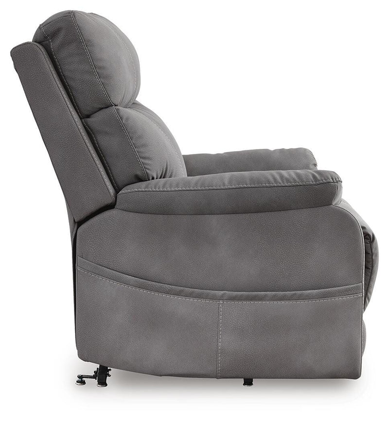 Ashley Furniture Next-Gen Durapella Power Lift Recliner with plush cushioning and side control panel, in a neutral fabric.