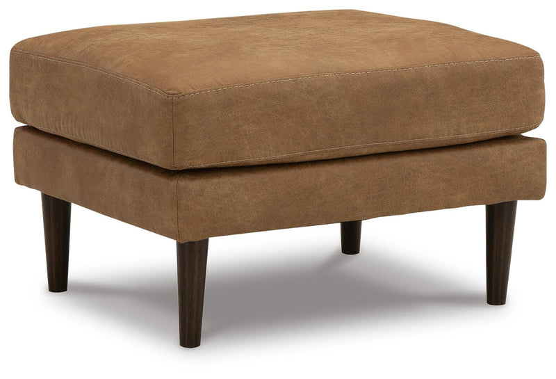 Ashley Furniture Telora living room set with sofa and loveseat, featuring plush cushions and modern design, shown from an angled side view.