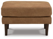 Ashley Furniture Telora living room set featuring a plush sofa and loveseat with neutral upholstery and modern design.