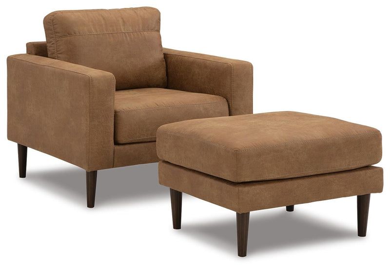 Ashley Furniture Telora living room set with a sofa and loveseat, featuring neutral upholstery and modern design.