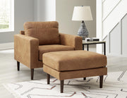 Ashley Furniture Telora living room set with sofa and armchair, featuring neutral upholstery and modern design.
