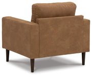 Ashley Furniture Telora living room set featuring a sofa and matching armchair with plush fabric upholstery.