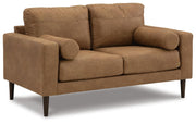 Ashley Furniture Telora living room set with a sofa and loveseat, featuring neutral upholstery and modern design.