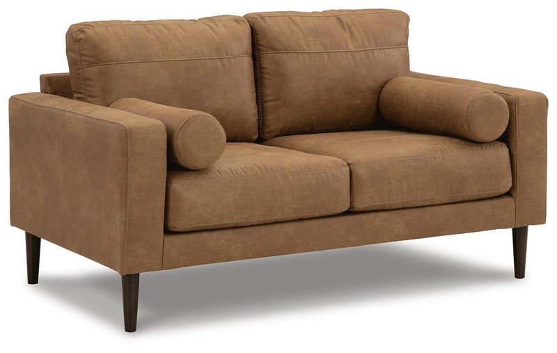 Ashley Furniture Telora living room set with a sofa and loveseat, featuring neutral upholstery and modern design.