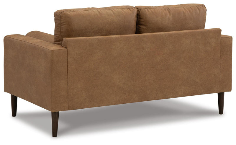 Ashley Furniture Telora living room set with sofa and loveseat, featuring plush cushions and modern design.