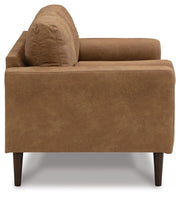 Ashley Furniture Telora living room set with sofa and armchair, featuring neutral upholstery and modern design.