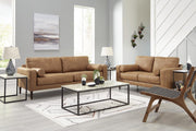 Ashley Furniture Telora living room set with sofa and armchair featuring neutral upholstery and modern design.