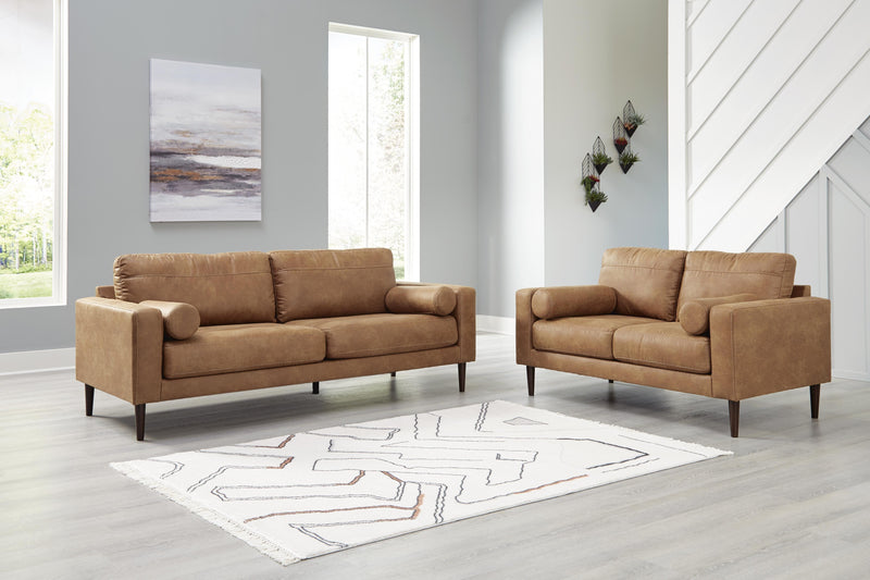 Ashley Furniture Telora living room set featuring a sofa and loveseat with plush cushions and modern design.