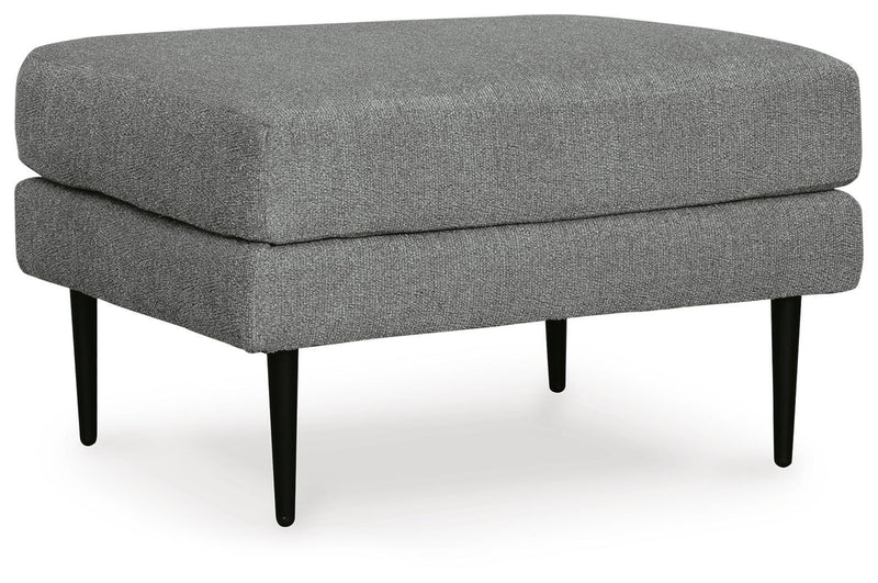 Ashley Furniture Hazela living room set with a sofa and armchair, featuring neutral fabric and contemporary design.