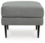 Ashley Furniture Hazela living room set with sofa and chairs, featuring plush cushions and stylish upholstery.