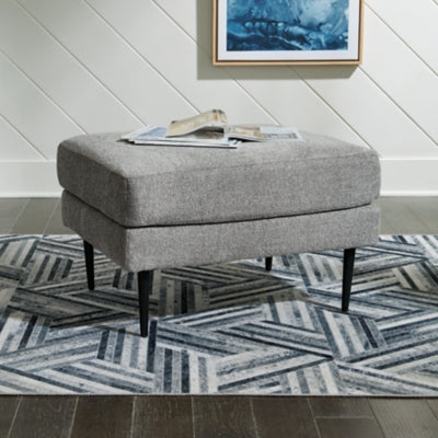 Ashley Furniture Hazela living room set with sofa, loveseat, and armchair in a modern design with neutral upholstery.