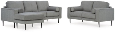 Ashley Furniture Hazela living room set featuring a sofa and armchair with neutral fabric upholstery and contemporary design.