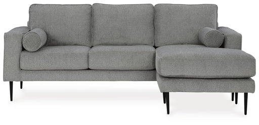 Ashley Furniture Hazela living room set featuring a stylish sofa and matching armchair with neutral upholstery.