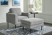 Ashley Furniture Hazela living room set featuring a sofa, loveseat, and armchair with neutral upholstery and modern design.