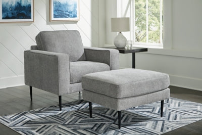Ashley Furniture Hazela living room set featuring a sofa, loveseat, and armchair with neutral upholstery and modern design.
