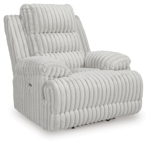 Ashley Furniture Rhines Falls power recliner in dark brown leather, showing a closed reclined position from an angled view.