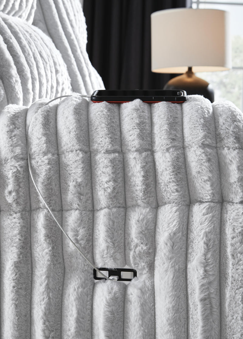 Ashley Furniture Rhines Falls power reclining loveseat with console, showing plush fabric, built-in USB ports, and reclining features.