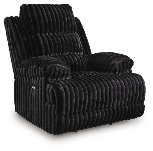 Ashley Furniture Rhine Falls power recliner in dark brown leather, showing the closed reclined position from an angled side view.