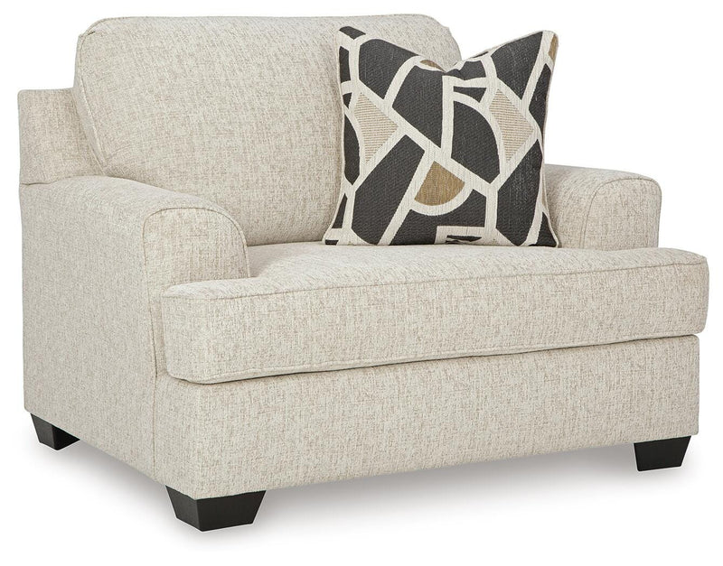 Ashley Furniture Heartcort oversized chair with plush fabric, angled view showing its spacious, comfortable design and modern style.