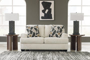 Ashley Furniture Heartcort loveseat with plush cushions and stylish upholstery, perfect for cozy living room seating.