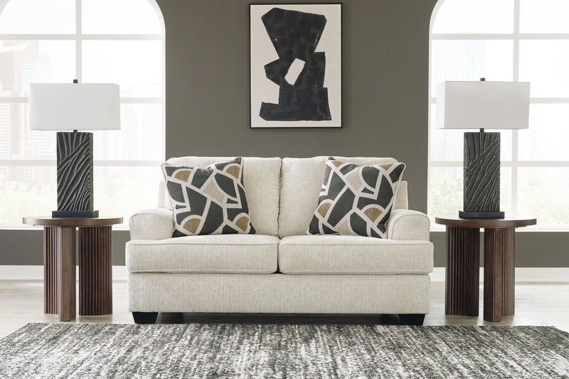 Ashley Furniture Heartcort loveseat with plush cushions and stylish upholstery, perfect for cozy living room seating.