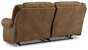 Ashley Furniture Boothbay Power Reclining Sofa with plush cushions and reclining features, shown in a cozy living room setting.