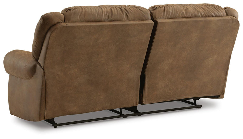 Ashley Furniture Boothbay Power Reclining Sofa with plush cushions and reclining features, shown in a cozy living room setting.