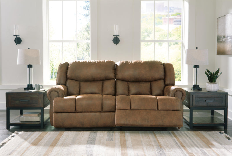 Ashley Furniture Boothbay power reclining sofa showing plush fabric, padded armrests, and reclining mechanism.
