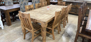 Sta. Rita 9-piece solid pine dining set with table and matching chairs by Monterrey Furniture, natural wood finish.