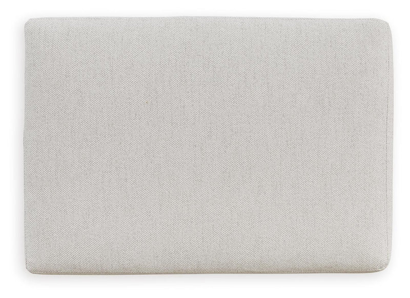 Ashley Furniture Maitelynn Ottoman with a soft fabric top, showcasing its stylish and functional design.