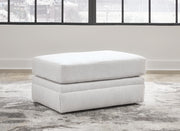 Ashley Furniture Maitelynn upholstery living room set with sofa and armchair, featuring plush fabric and modern design.
