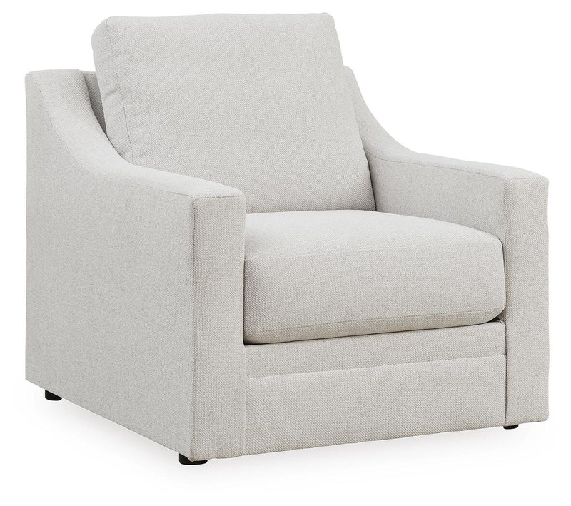 Ashley Furniture Maitelynn Chair with plush upholstery and wooden legs, shown from an angled view.