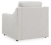 Ashley Furniture Maitelynn upholstery living room set with plush fabric, includes sofa and armchair, shown from the back.