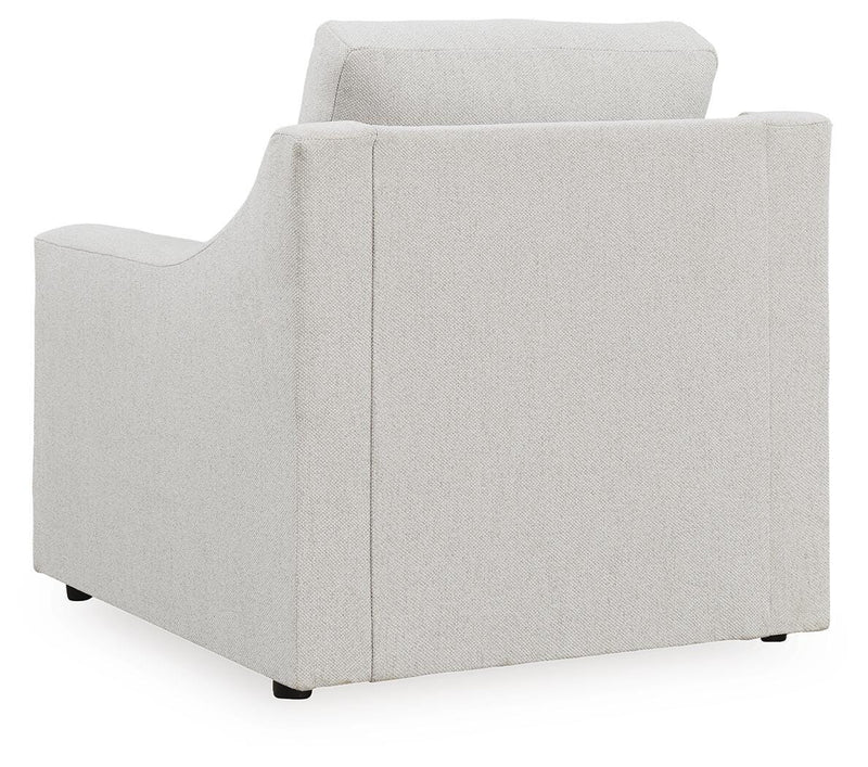 Ashley Furniture Maitelynn upholstery living room set with plush fabric, includes sofa and armchair, shown from the back.