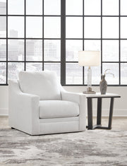 Ashley Furniture Maitelynn Chair with plush fabric and modern design, featuring a comfortable padded seat and stylish wooden legs.