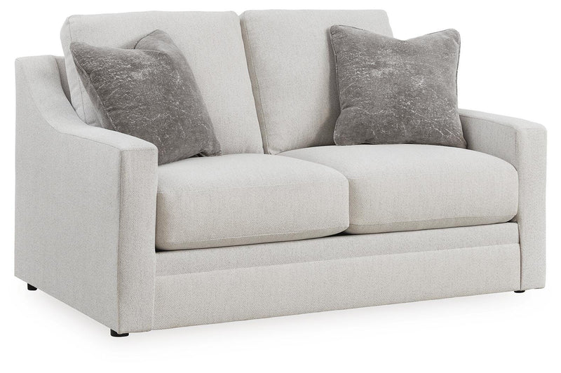 Ashley Furniture Maitelynn upholstery package, living room set featuring sofa and chair, shown from an angled side view.