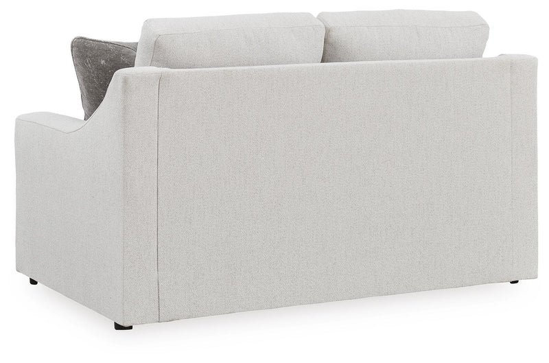 Ashley Furniture Maitelynn loveseat with plush fabric and cushioned back, designed for comfortable seating in living rooms.